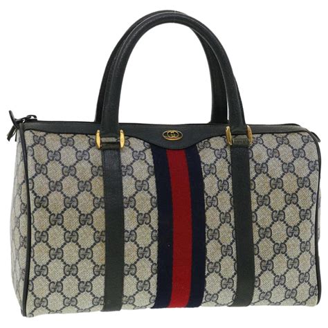 gucci monogram sherry boston bag fake|Gucci Navy Canvas Sherry Line Boston Bag Euc .